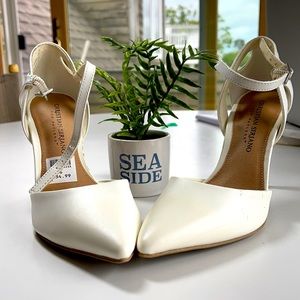 Christian Soriano White heels.